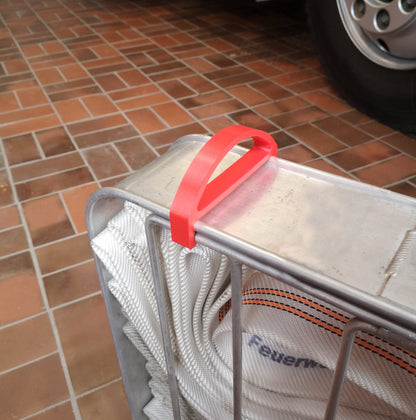 Clip / Schnellverschluss für Schlauchtragekorb nach DIN 14827. Der Clip ermöglicht ein leichtes öffnen und verschließen der Schlauchtragekörbe, auch mit Handschuhen und unter Stress